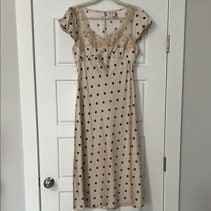 Elegant Beige Dress with Black Dots